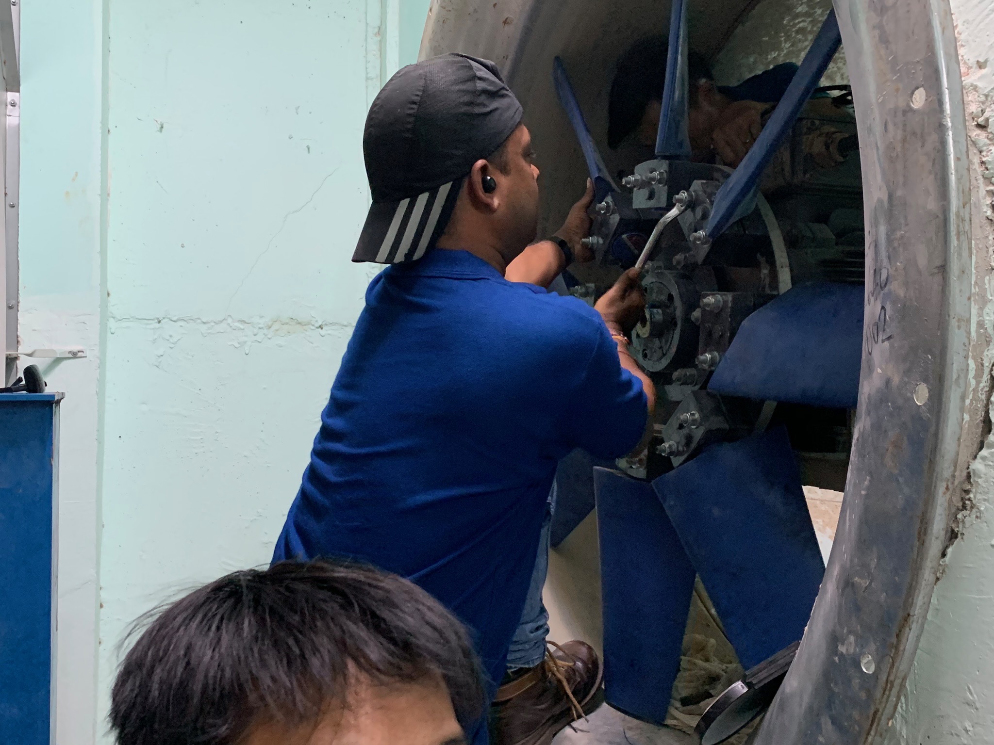 On-site installation work inside the fan casing